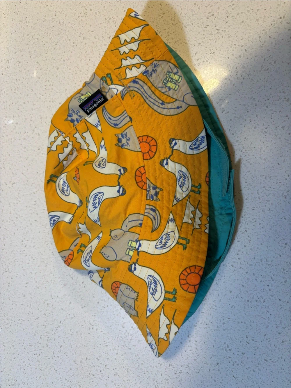 Patagonia Reversible Kids Sun Bucket Hat in Yellow with Teal Lining